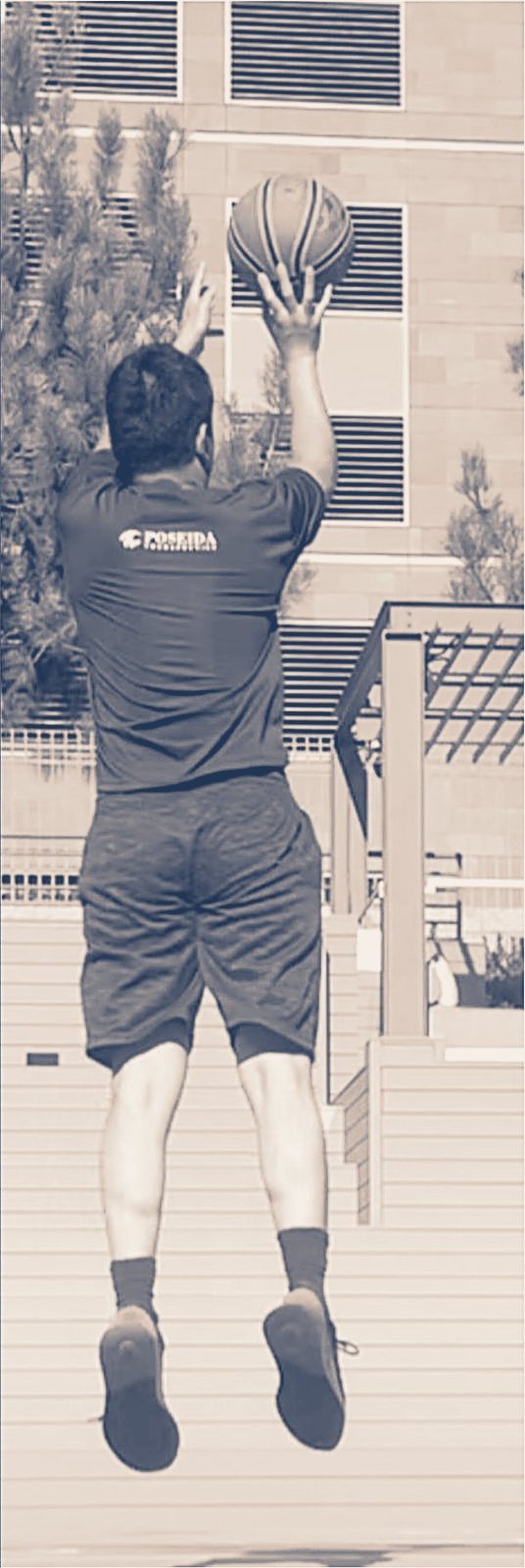 Karl shooting a basketball