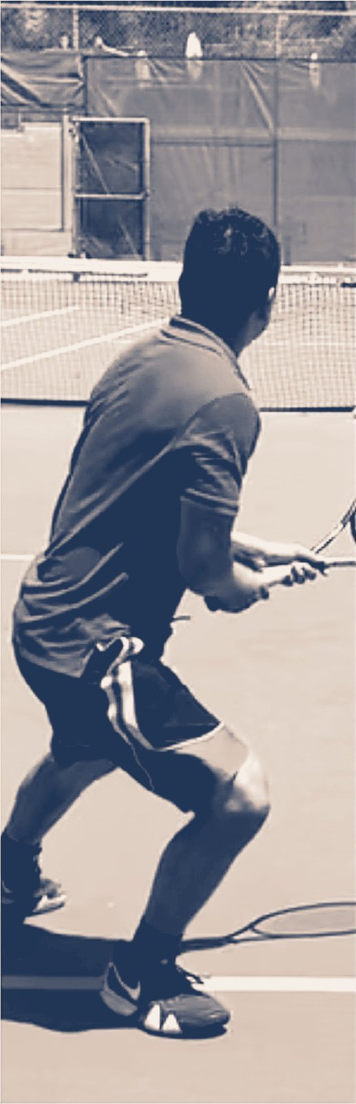 Karl playing tennis